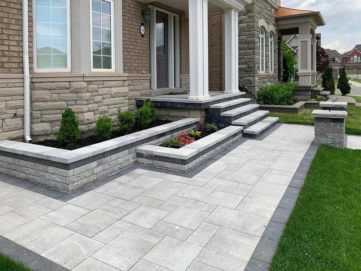 Interlock walkway and landscaped front yard